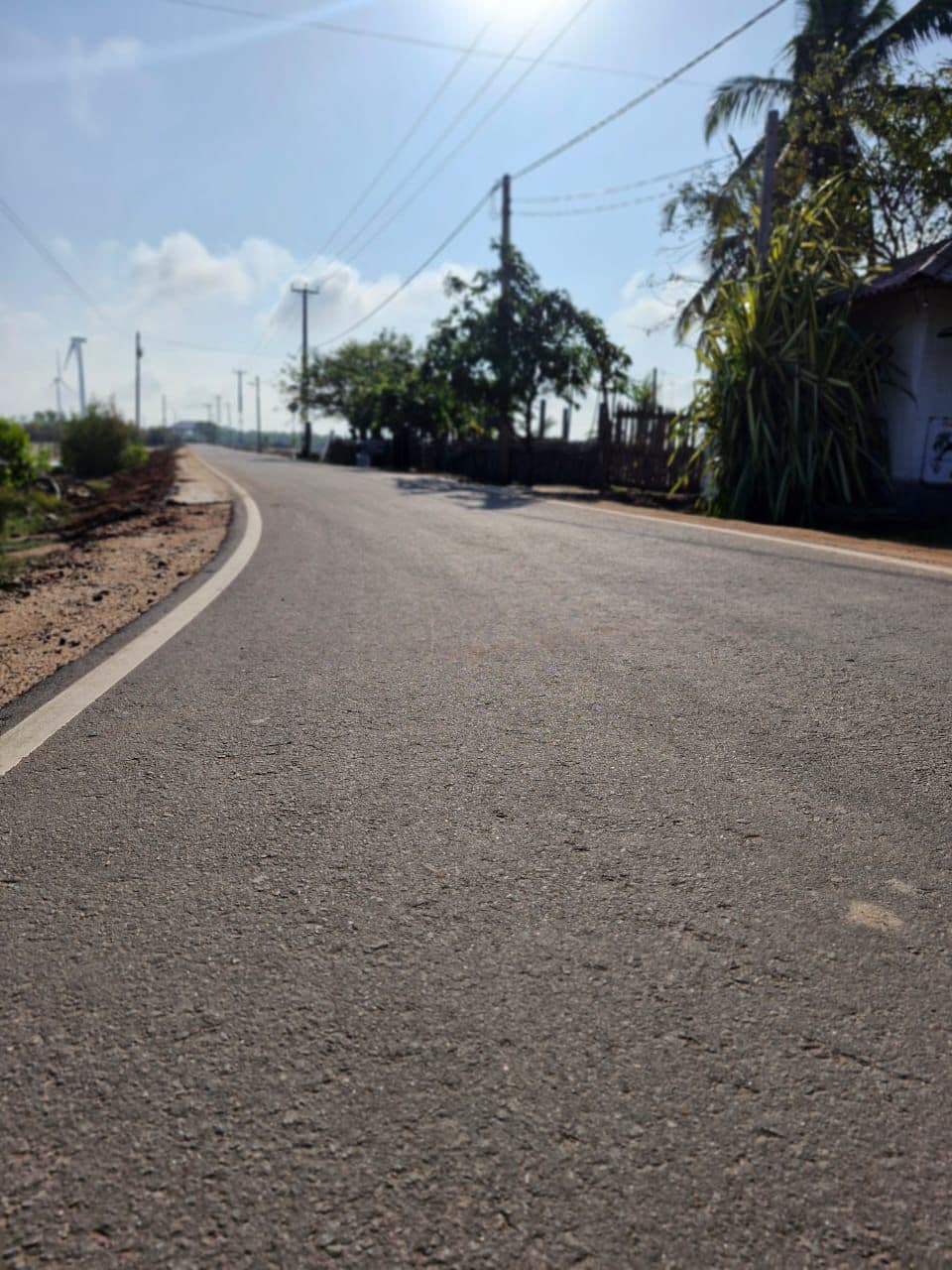 Empty Road Wind Turbines Low Angle