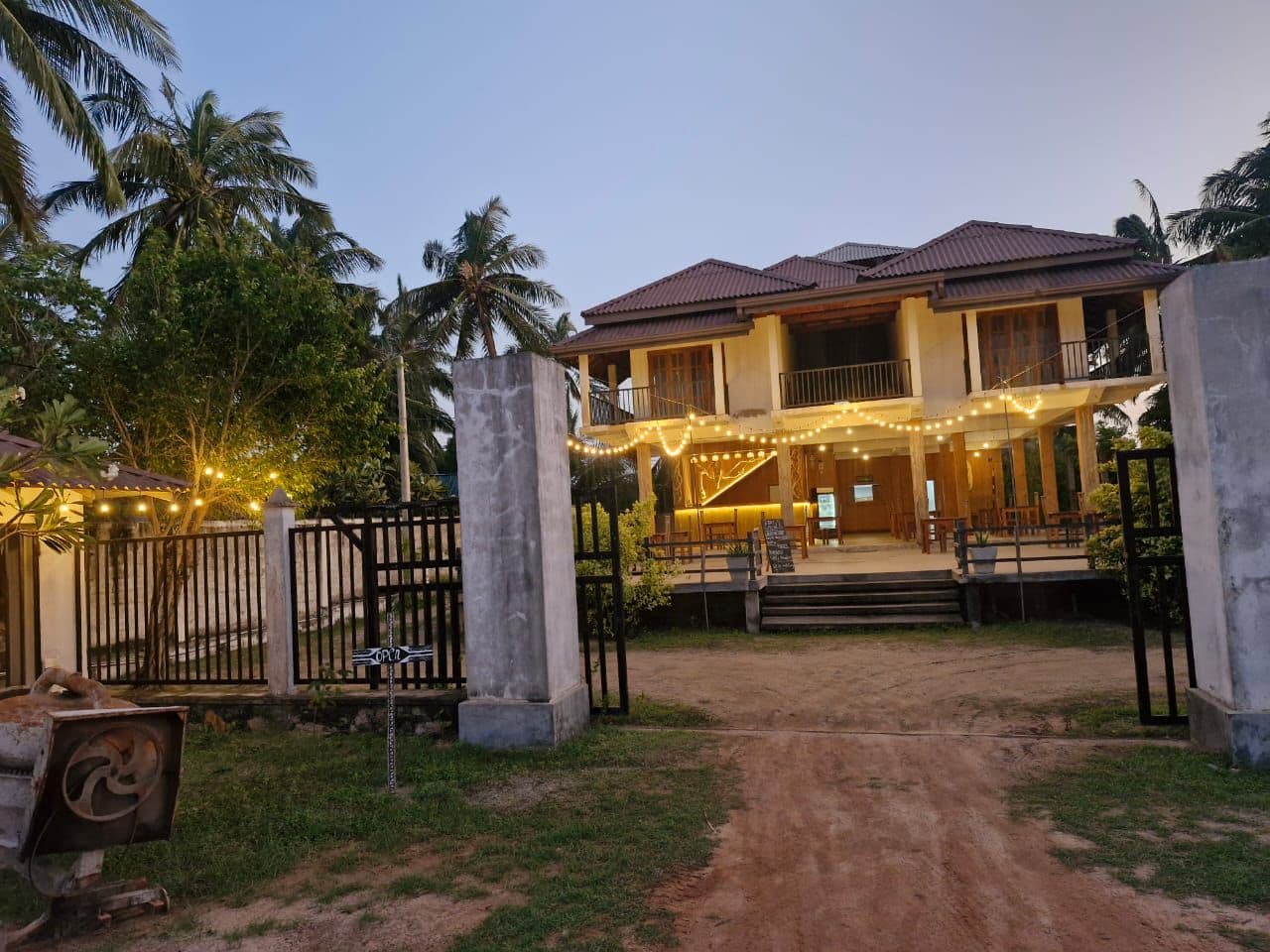 Guesthouse Fairy Lights Dusk Gate