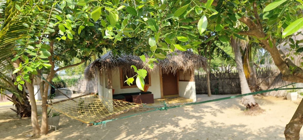 Hammock Trees Thatched Bungalow