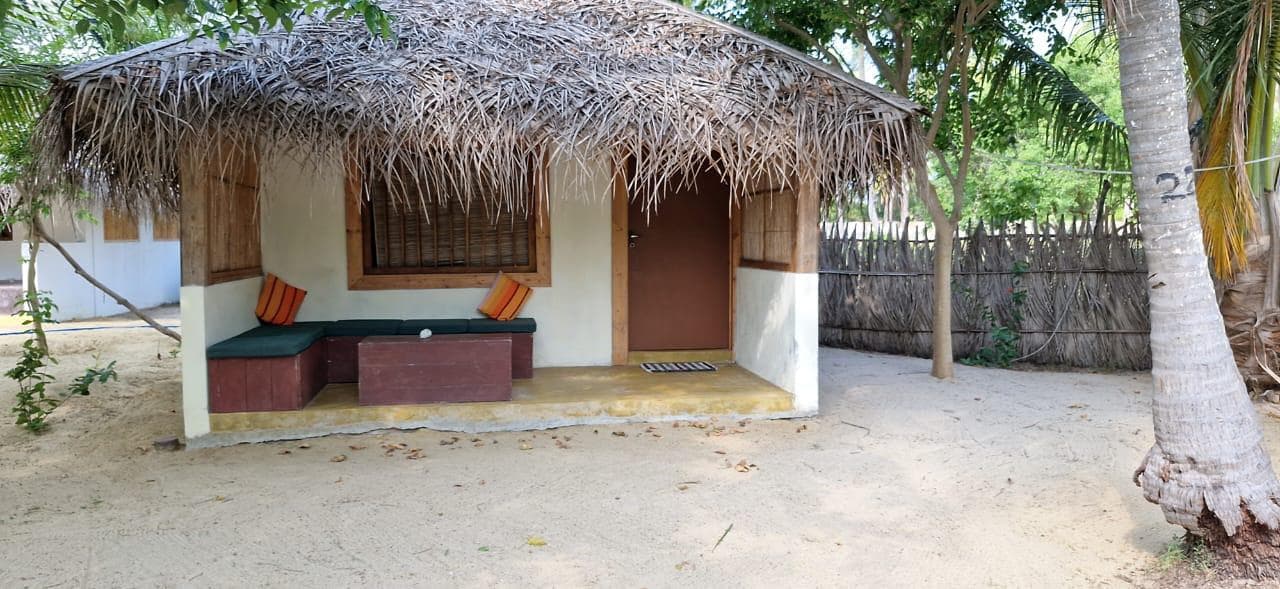 Thatched Bungalow Orange Bench Sandy