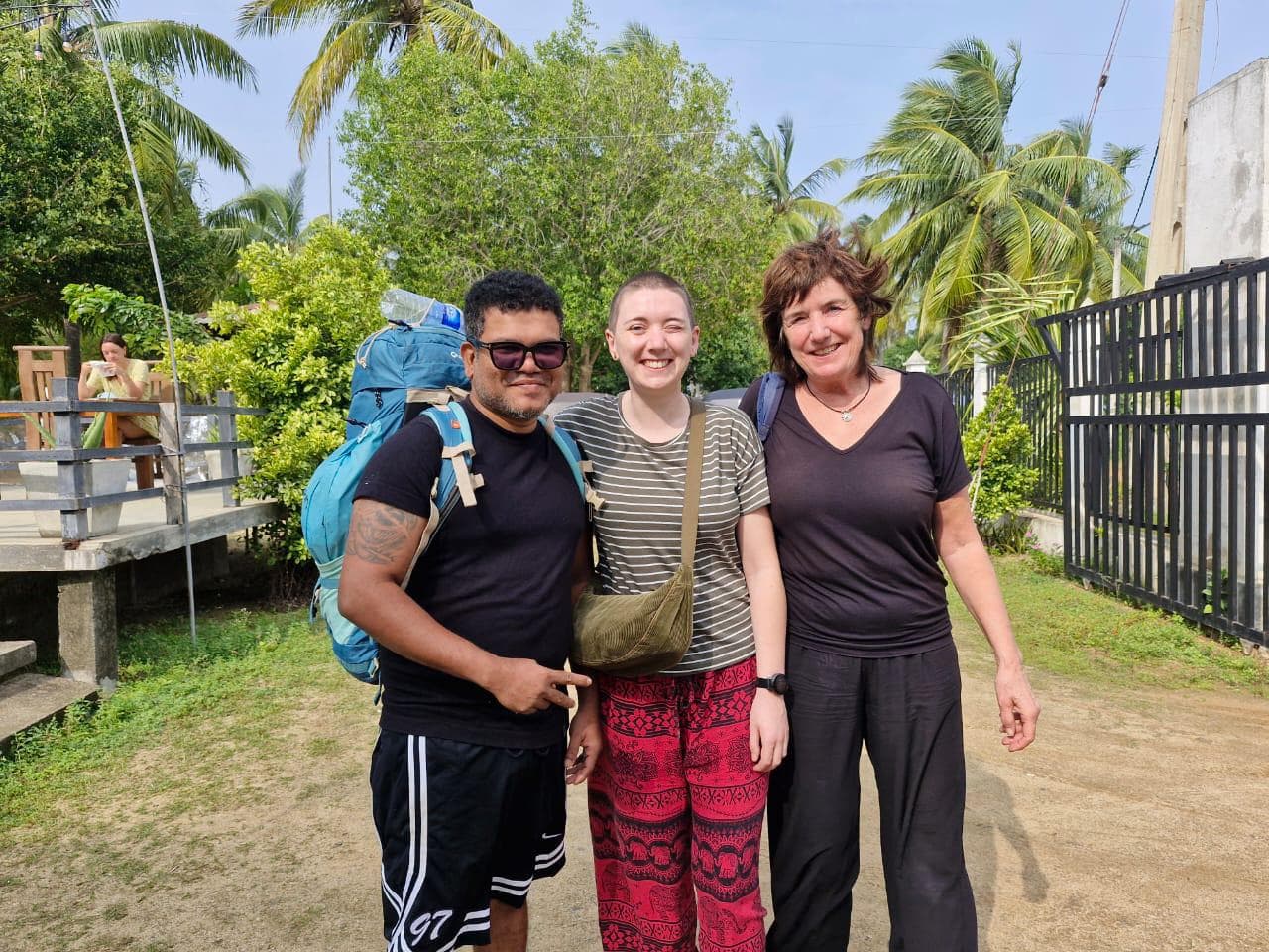 Three Backpackers Posing Outdoor