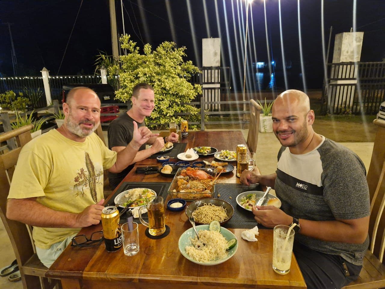 Three Men Lobster Beer Dinner Outdoor