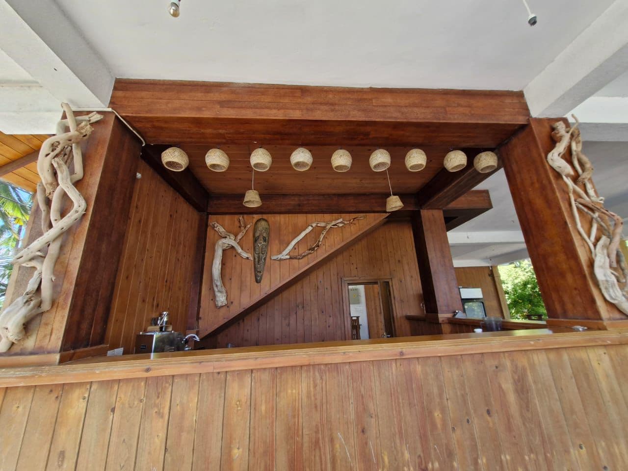 Wooden Bar Rattan Lights Tribal Mask