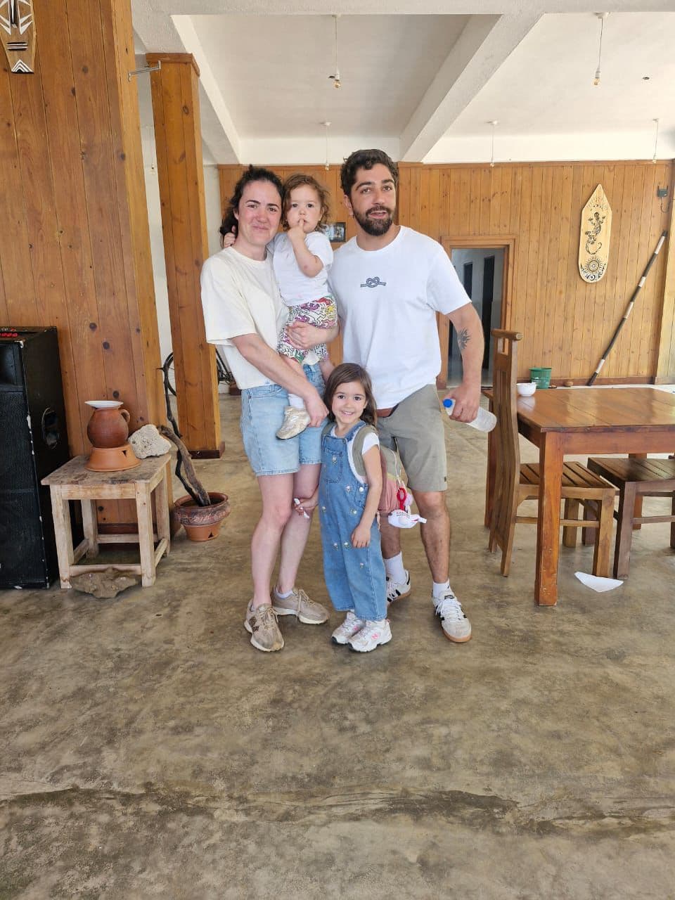 Family of four posing at the restaurant